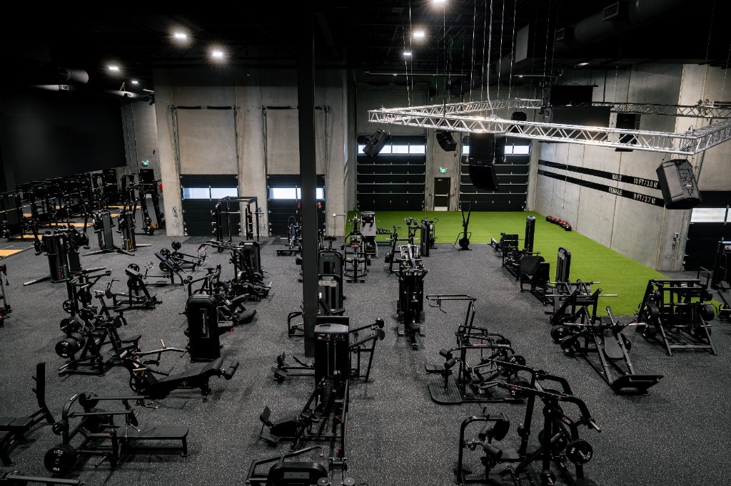 Iron Lore Edmonton gym floor with the hanging stereo system
