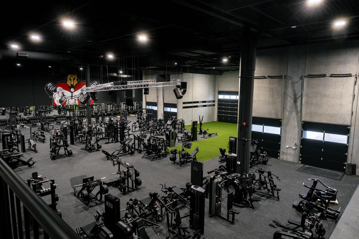 Iron Lore Gym Edmonton — mezzanine view over the strength floor and turf zone