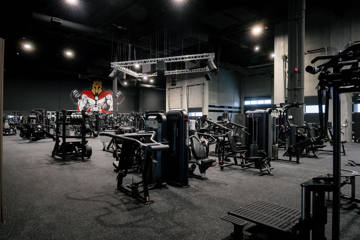 Iron Lore Gym Edmonton — Atlantis machines on the main gym floor